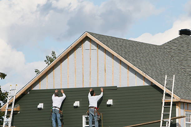 Professional Siding Installation technician working in Leetonia, OH